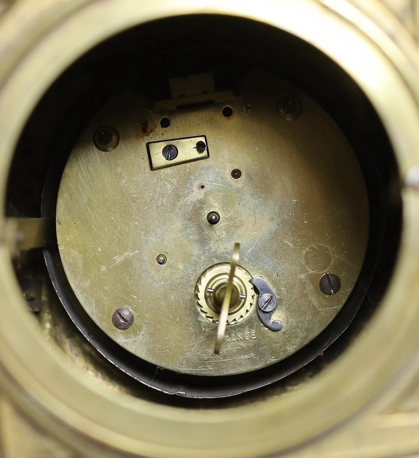 A brass French mantel timepiece with balance escapement, 4cm high